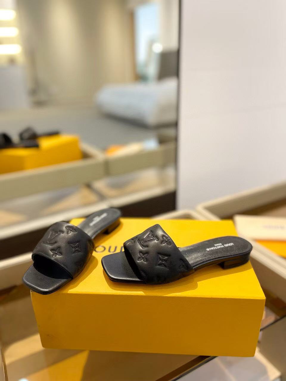 LV Neo Revival Mule Flat Black Embossed Logo Cowhide