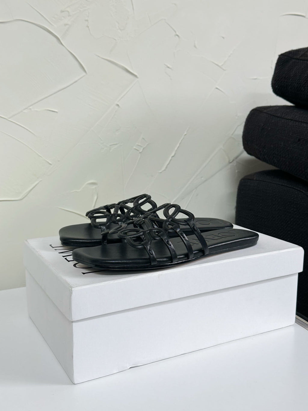 Petal Anagram Slide in Black Soft Calfskin 273512