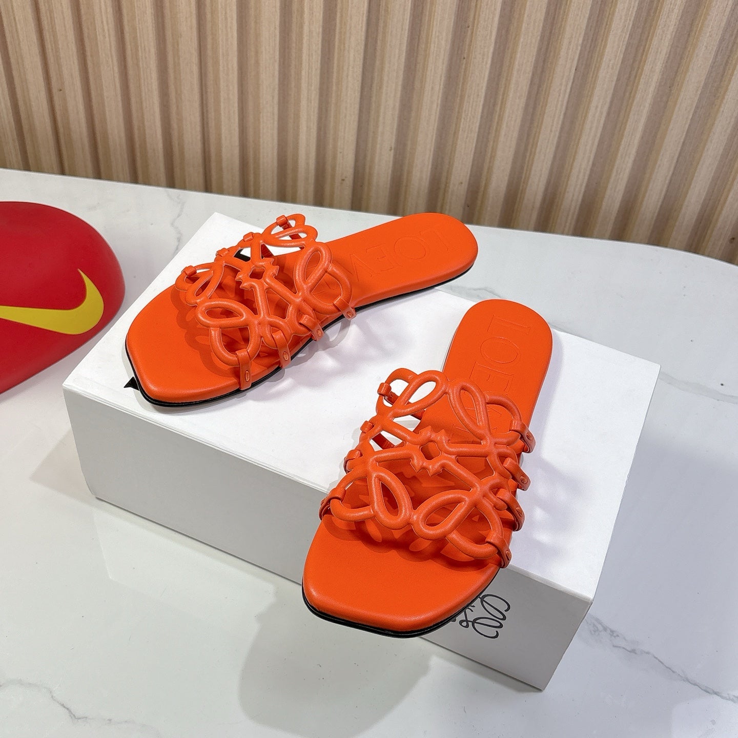 Petal Anagram Slide in Orange Soft Calfskin 273740
