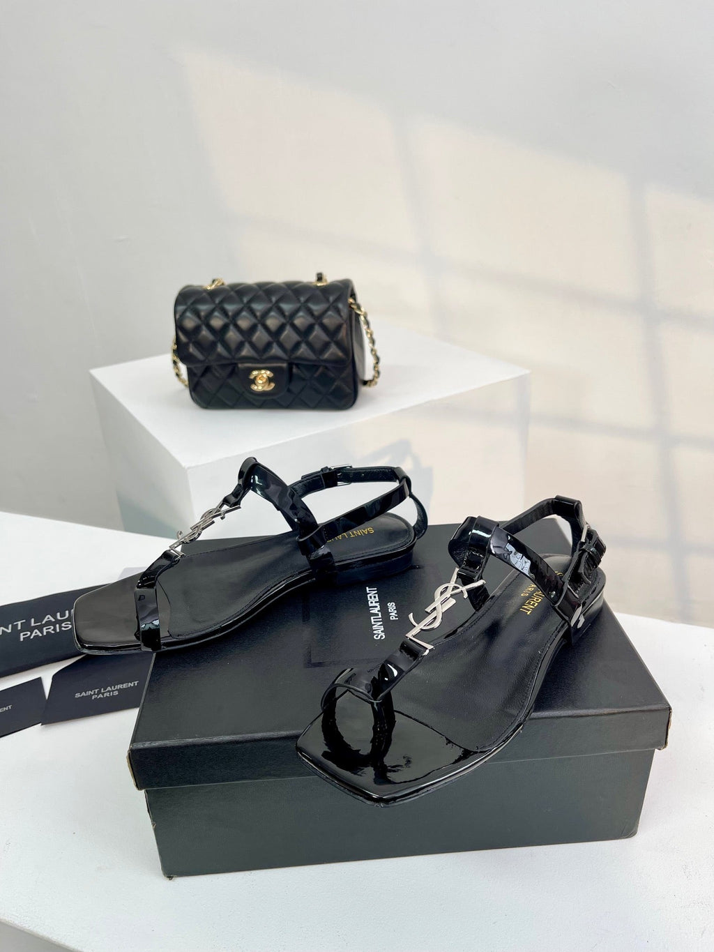 SL CASSANDRA ONE SANDAL FLAT BLACK CALFSKIN