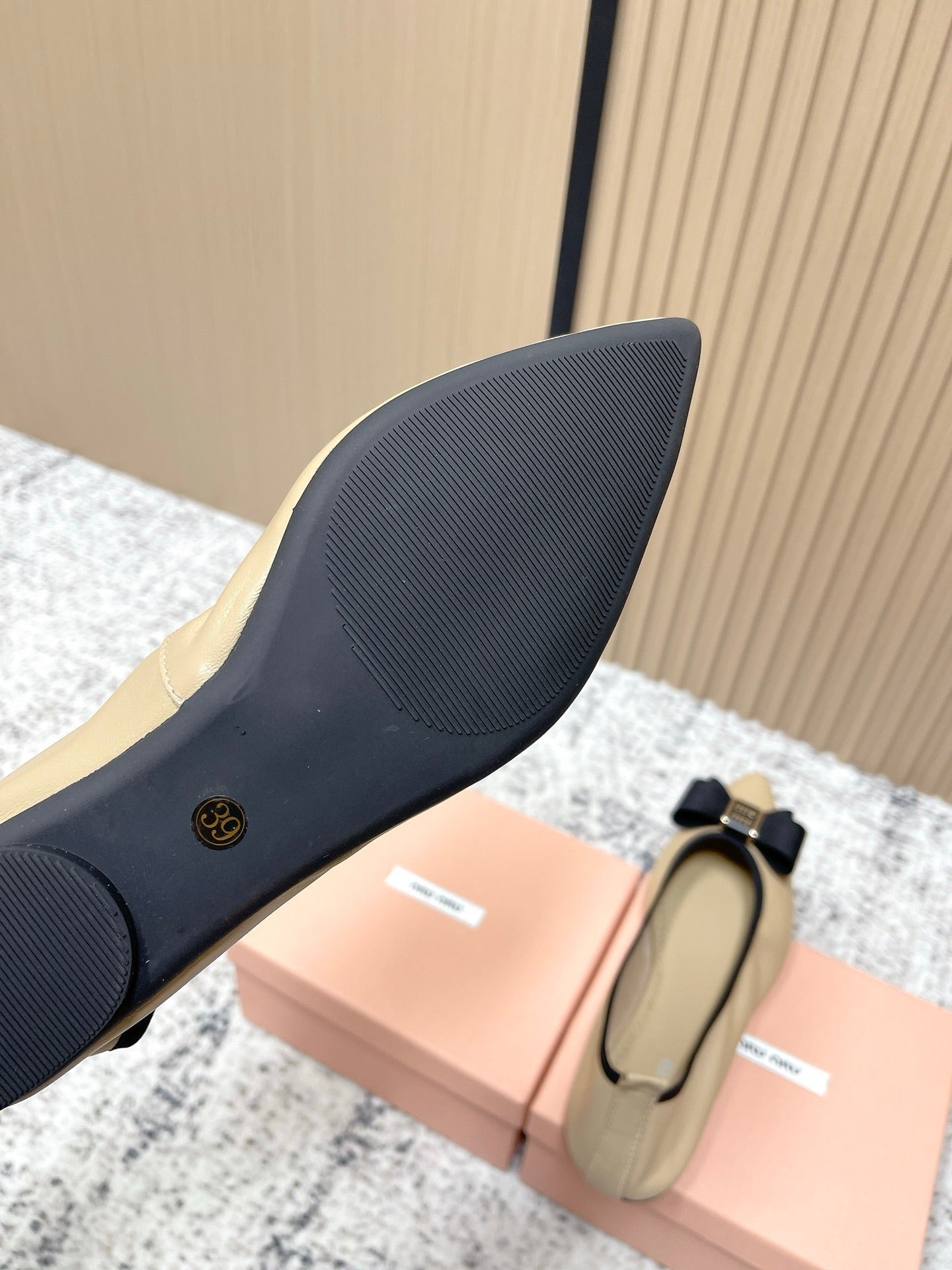 Miu Pointed-Toe Ballet Flats Beige Black Sheepskin 591562