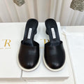 The Row  Mules 50mm Black Sheepskin 324739