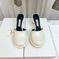 The Row  Mules 50mm White Black Sheepskin 324740