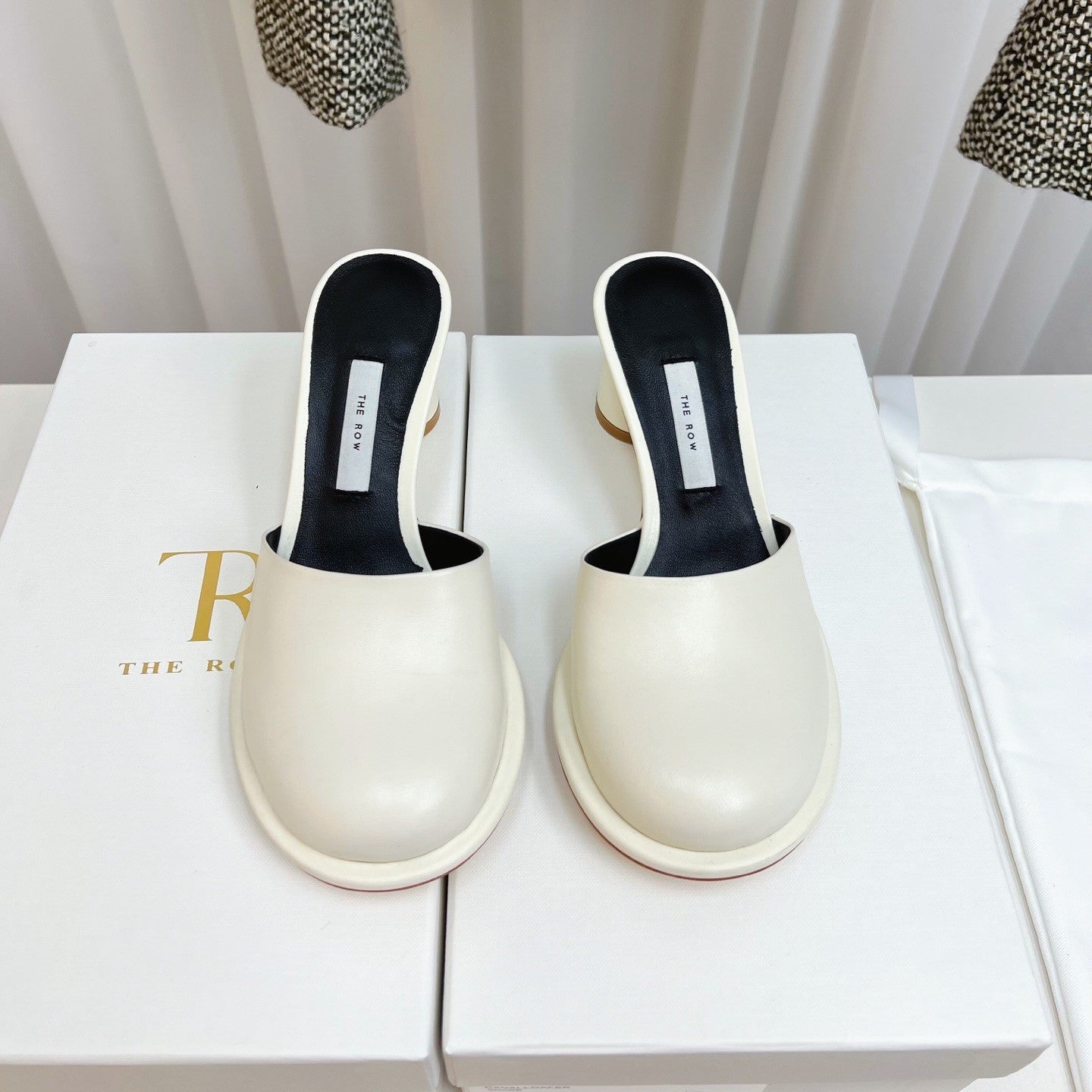 The Row  Mules 50mm White Black Sheepskin 324740