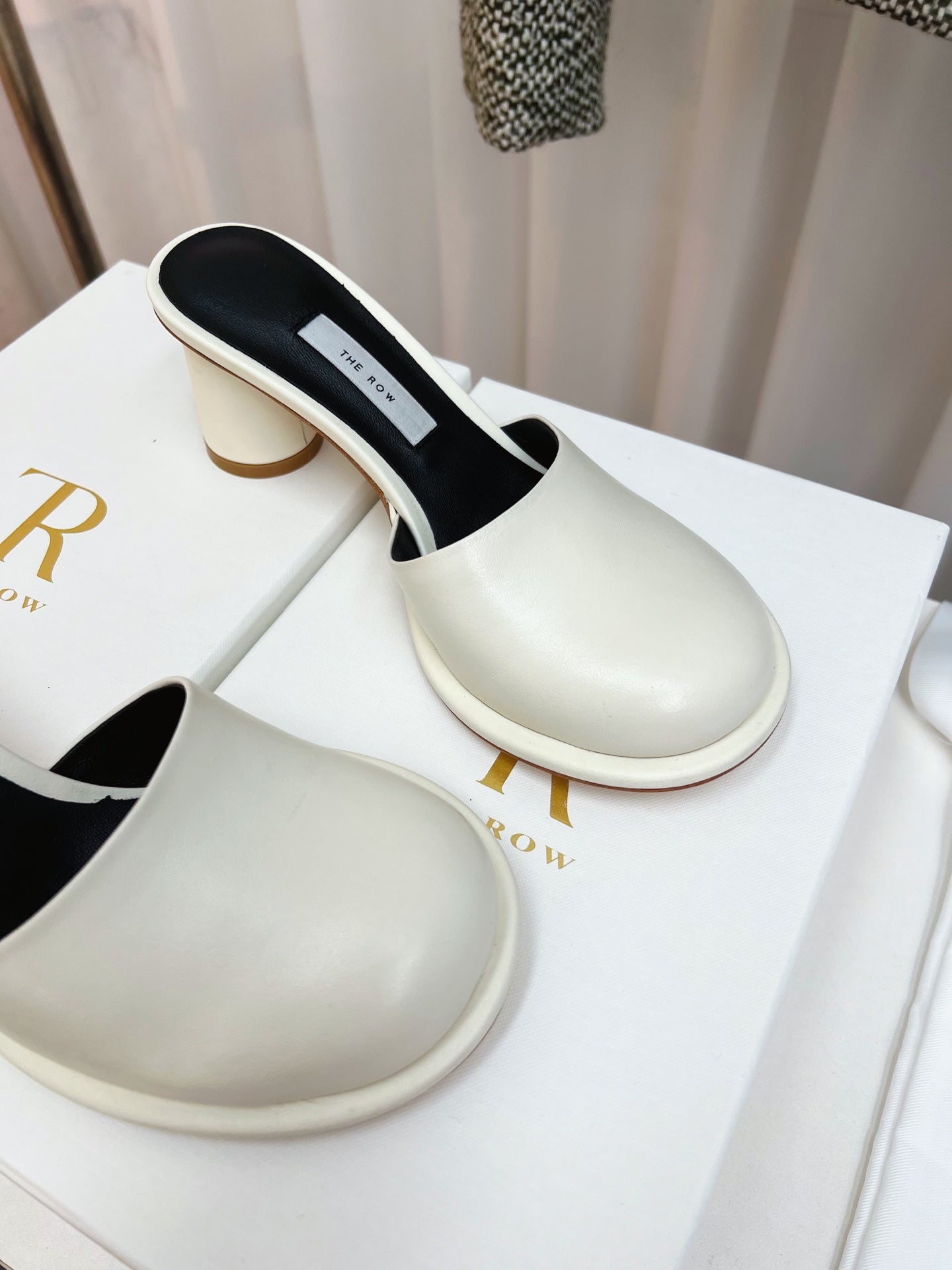 The Row  Mules 50mm White Black Sheepskin 324740