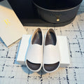 The Row Slide Mules White Black Sheepskin 334355