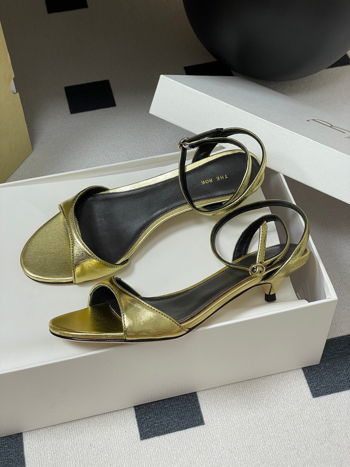 The Row 25S Strap High Heel Sandals 35mm Black Mix Gold Metallic Cowhide 286202