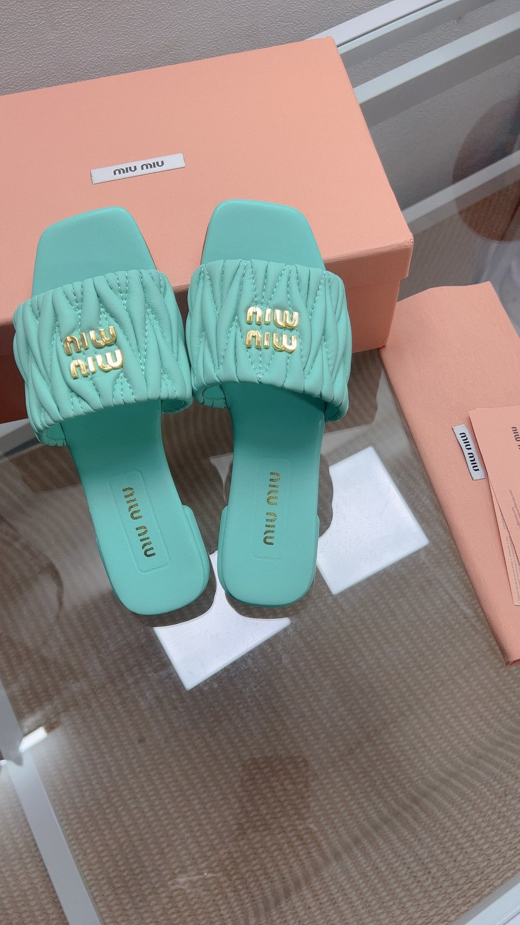 Miu Matelassé Slides Light Blue Leather 739553