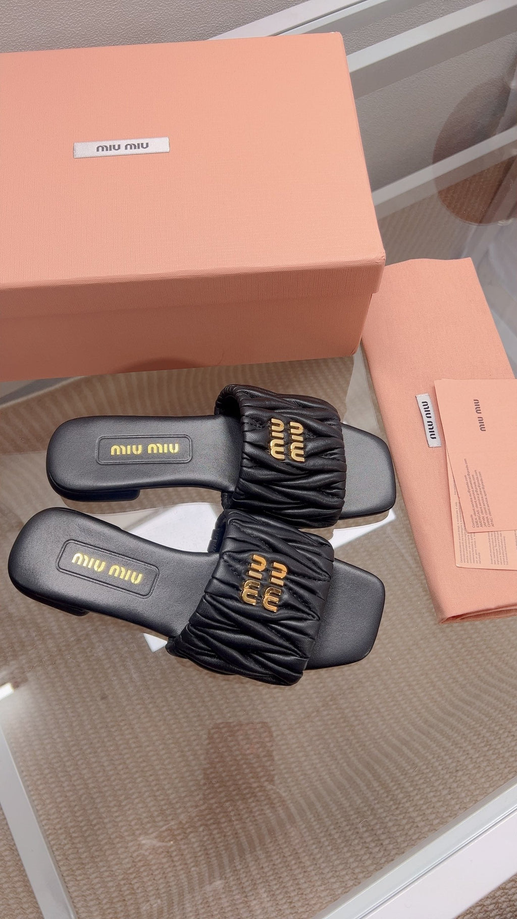 Miu Matelassé Slides Black Leather 739554