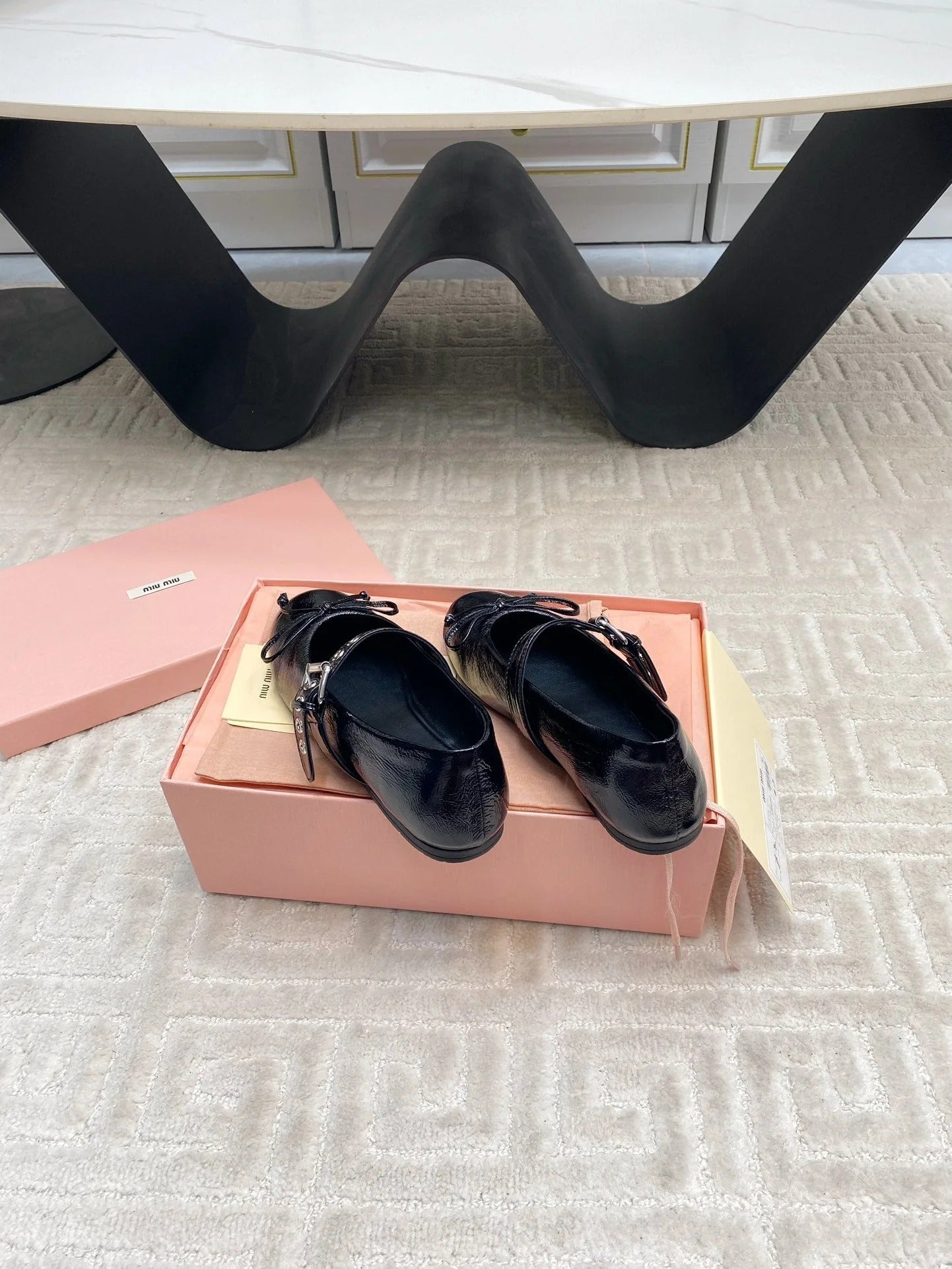 BOW MARY JANE FLAT IN BLACK NAPLAK LAMBSKIN